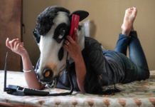 Indian women wear cow masks to ask: are sacred cattle safer than us?
