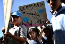 Syrians stuck in Greece protest outside German embassy