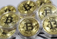 Bitcoin price soars above $5,000 to record high