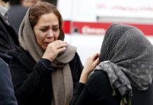 Iranian rescue teams find site and wreckage of crashed plane