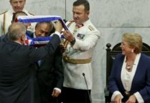 Conservative billionaire Pinera sworn in as president of Chile