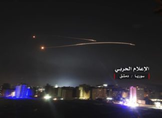 Israel hits dozens of Iranian targets in Syria after barrage
