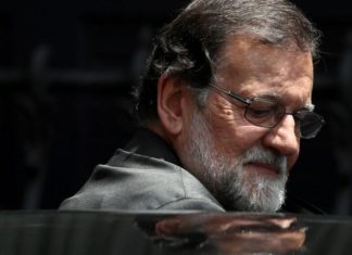 Ex-Spain PM Rajoy steps down as party leader