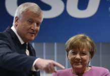 Chaos in Merkel’s coalition after key minister offers to resign