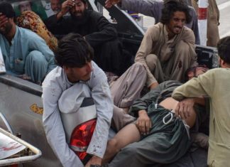 Blast at election campaign event kills at least 128 people in Pakistan