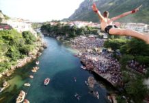 Bosnia’s Mostar town finds peak in centuries-old bridge diving